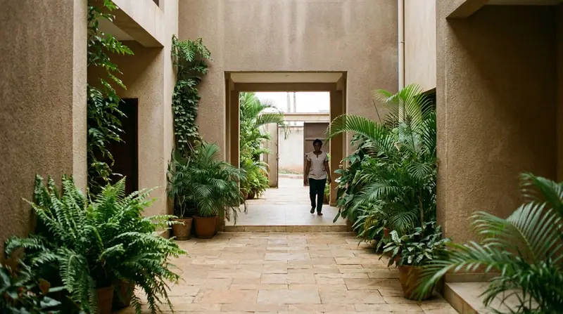 Courtyard and entrance of a quiet boutique property in Yaoundé.